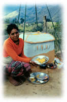 woman at shrine in Nepal